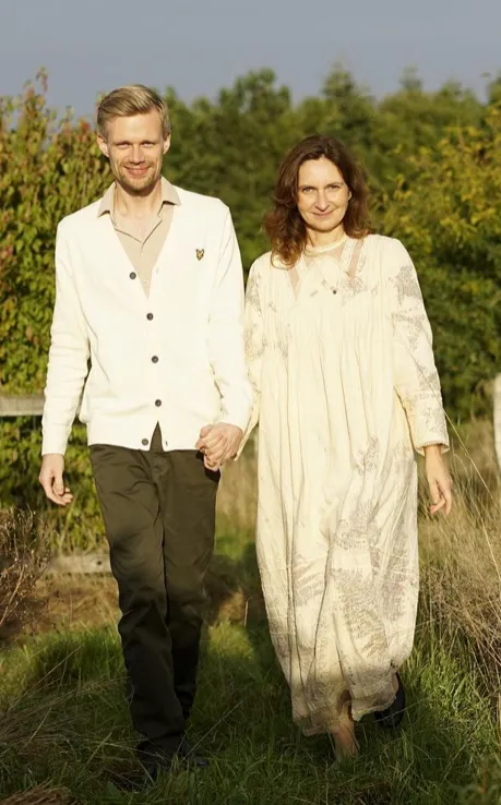 Mark & Gabi founders of Ateliers Zen walking together during sunset.