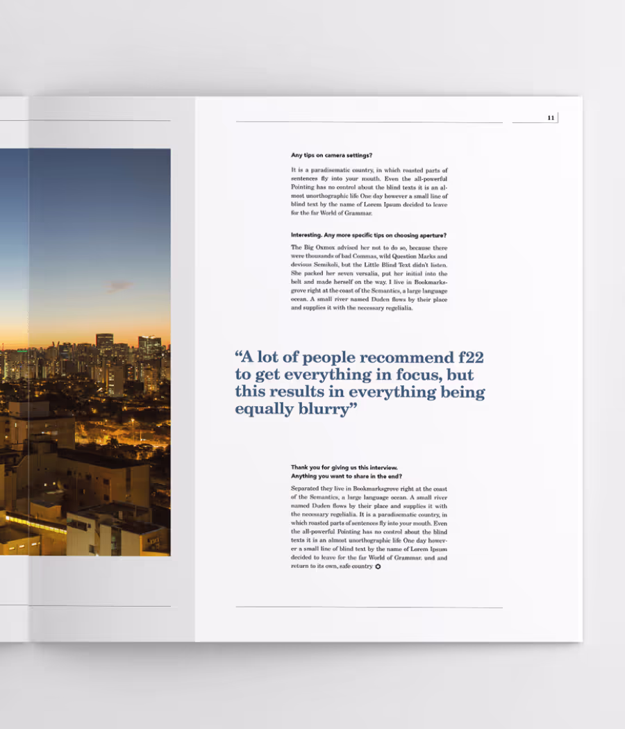 Magazine spread featuring a cityscape photo at sunset on the left and a text interview on the right with a highlighted quote about camera aperture f22.